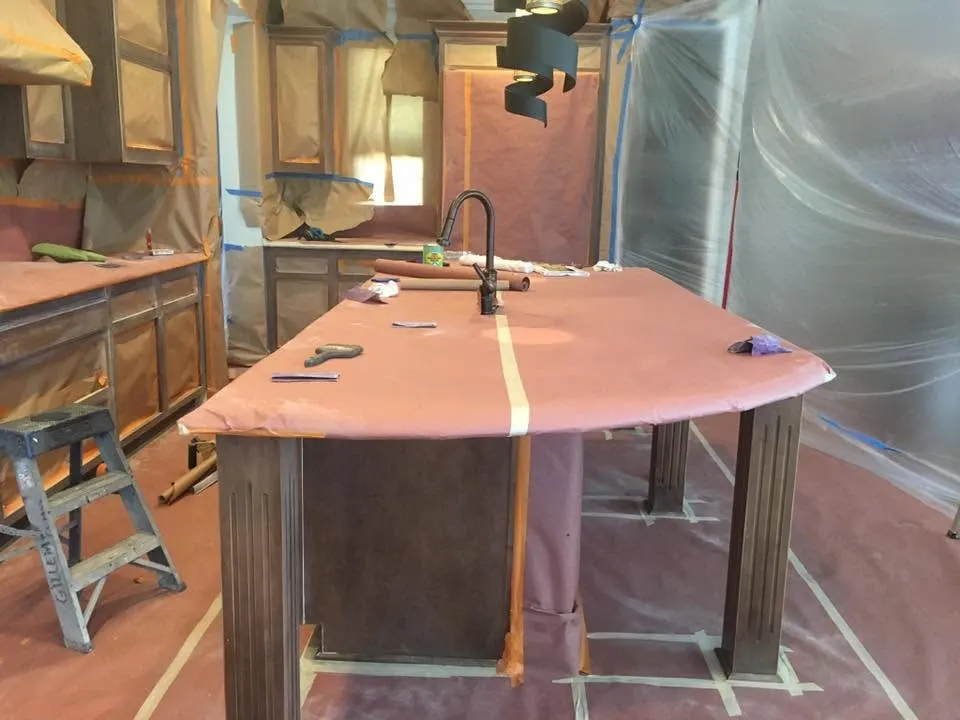 Kitchen cabinets masked and prepped for spray painting in El Cajon, CA